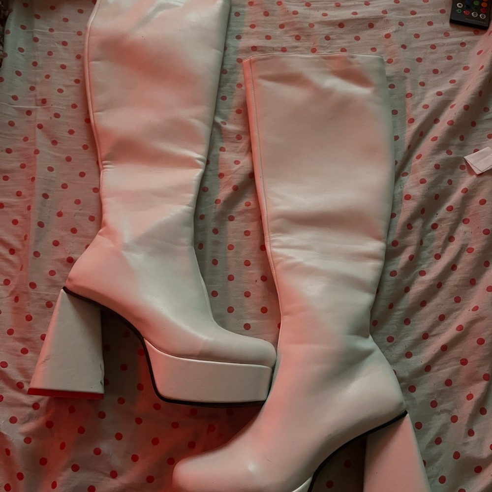 Heart heeled platform boots from Lamoda size 8 leather material. Only worn once